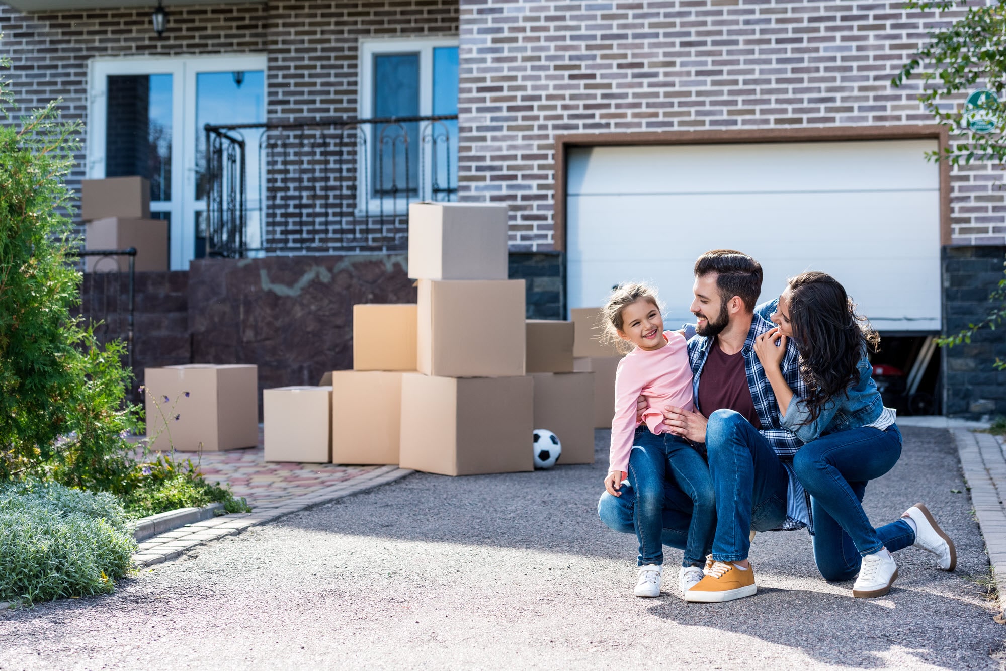 Young family ready to move home following conveyancing. Young family ready to move home following conveyancing.