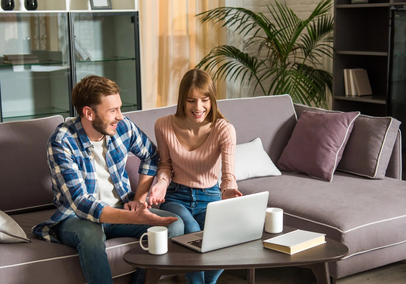 A couple deciding which conveyancing agent to work with. A couple deciding which conveyancing agent to work with.